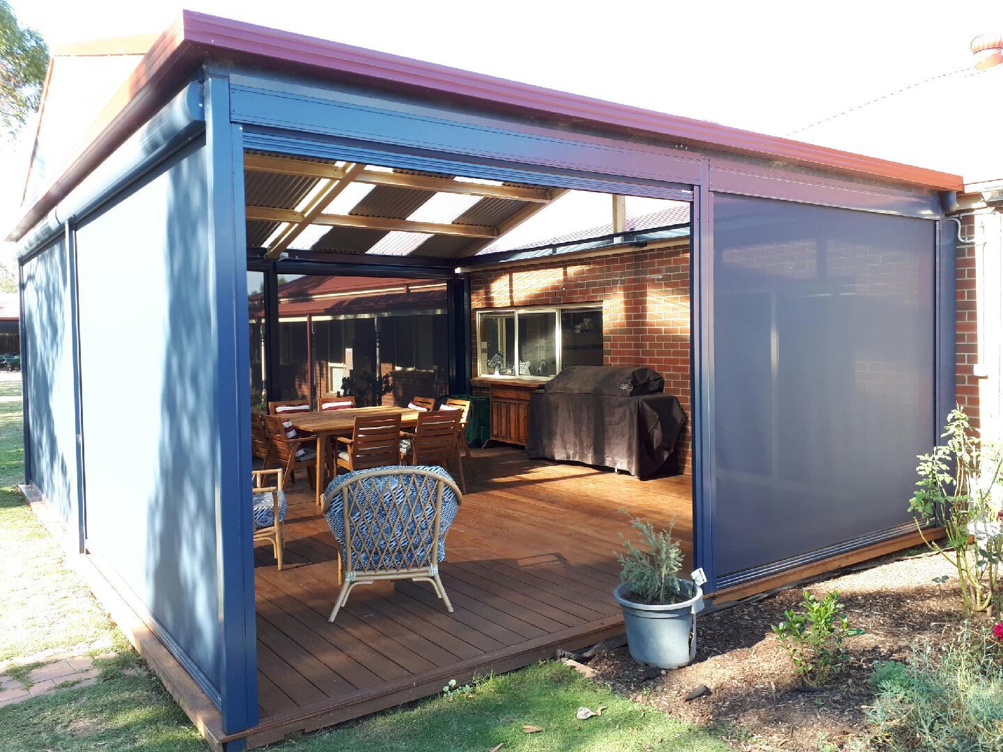 Outdoor blinds enclosing a timber deck in Melbourne