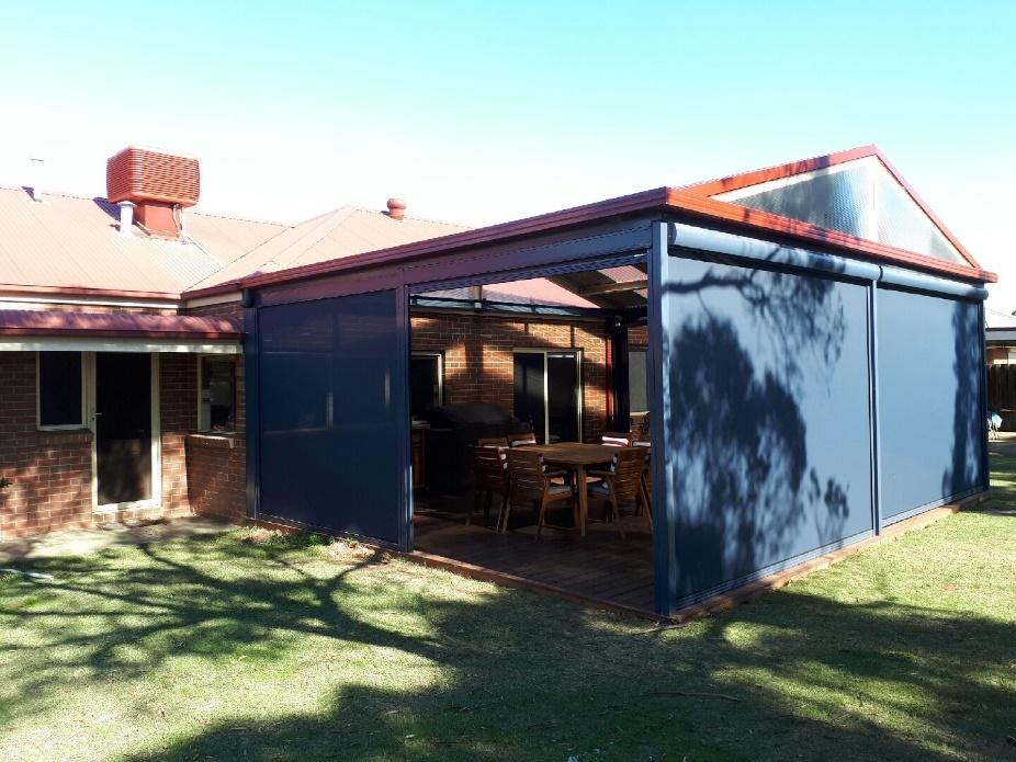 Alfresco area enclosed with outdoor blinds